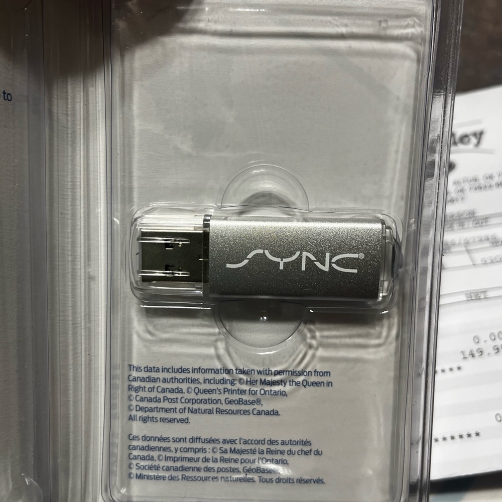 Silver SYNC USB Flash Drive Ford software map update. Purchased in October 2024.